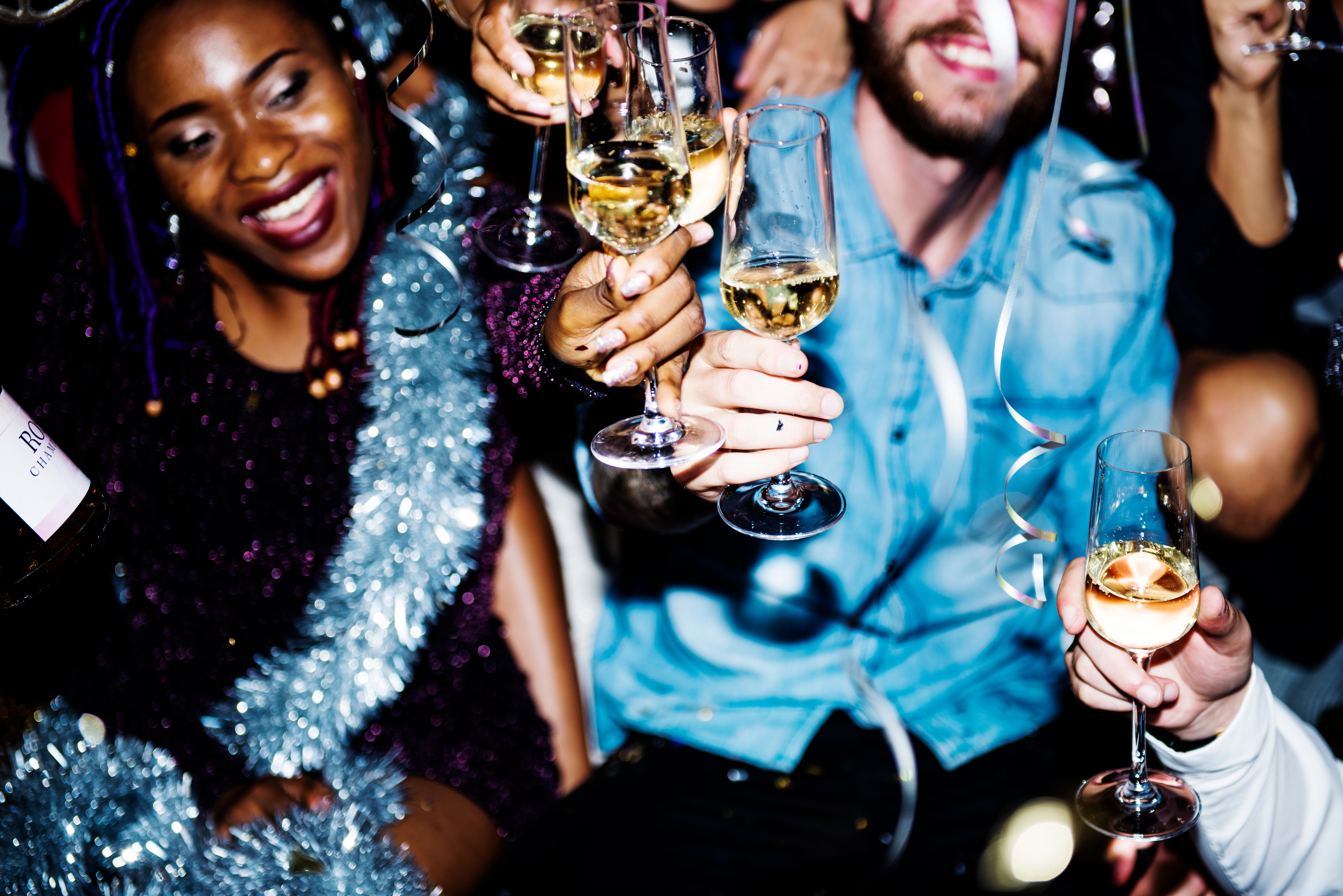 People celebrating New Year's Eve with Champagne