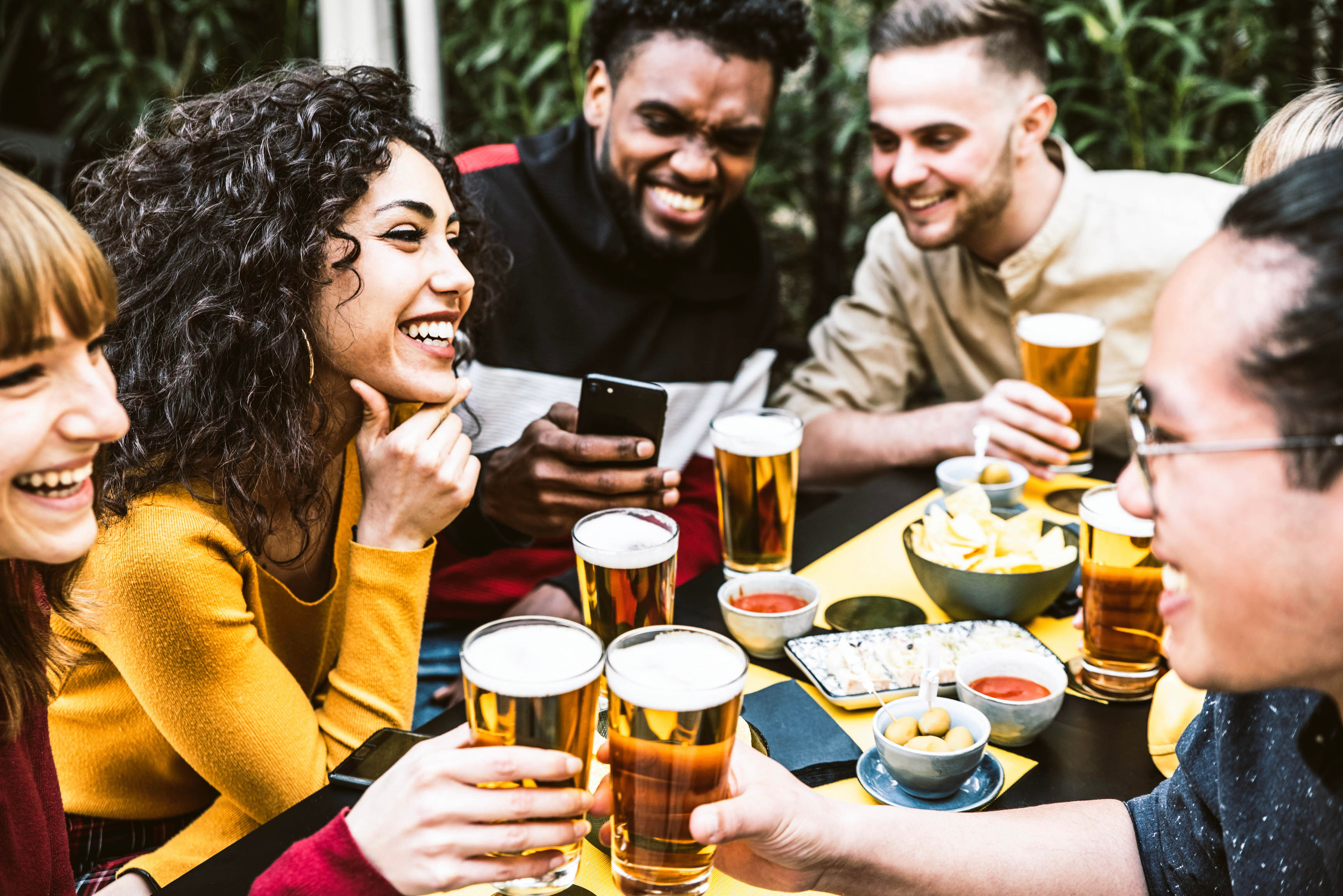 people drinking non-alcoholic beer at a restaurant