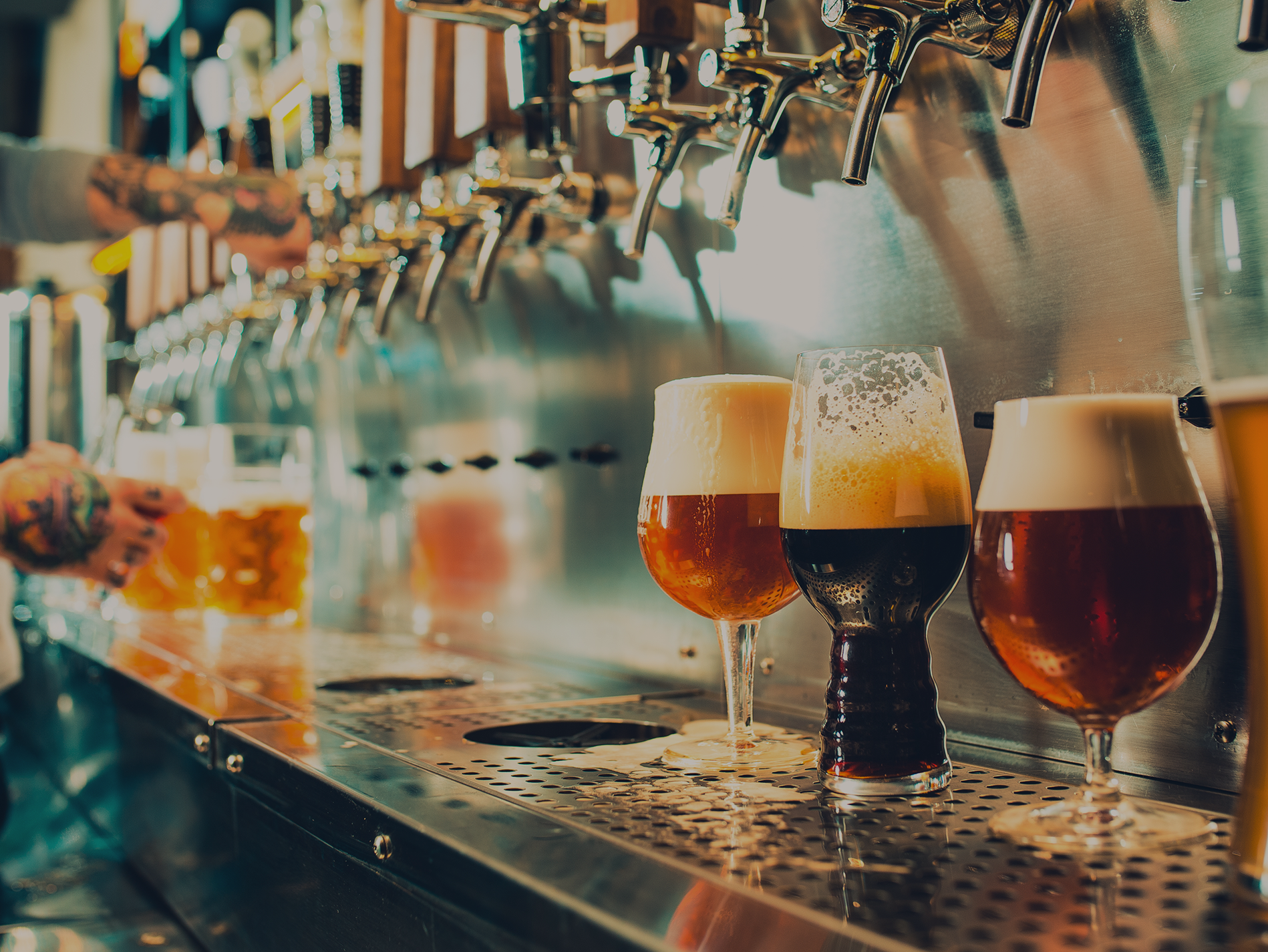 beer glasses being filled