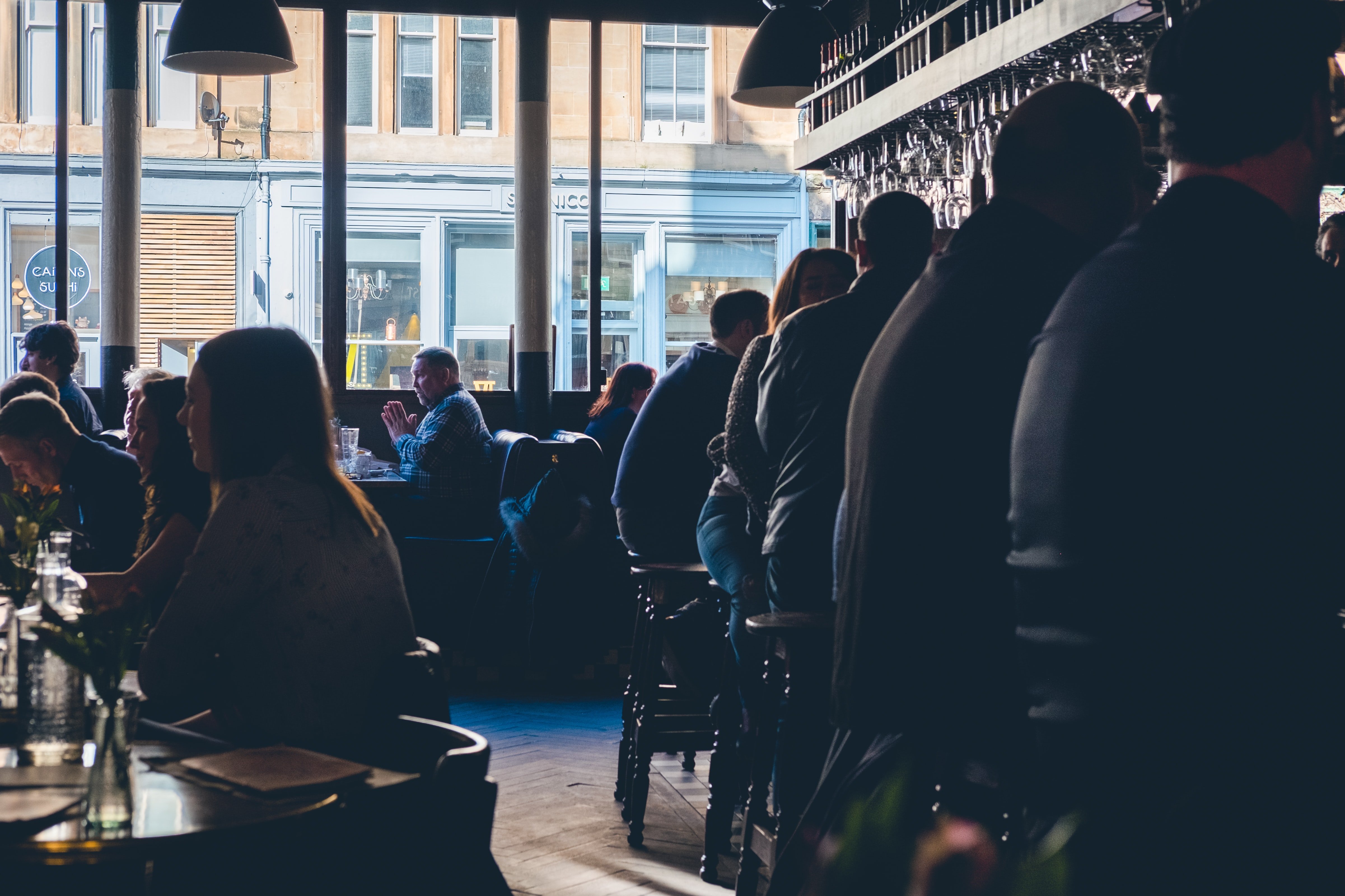 People drinking at a bar