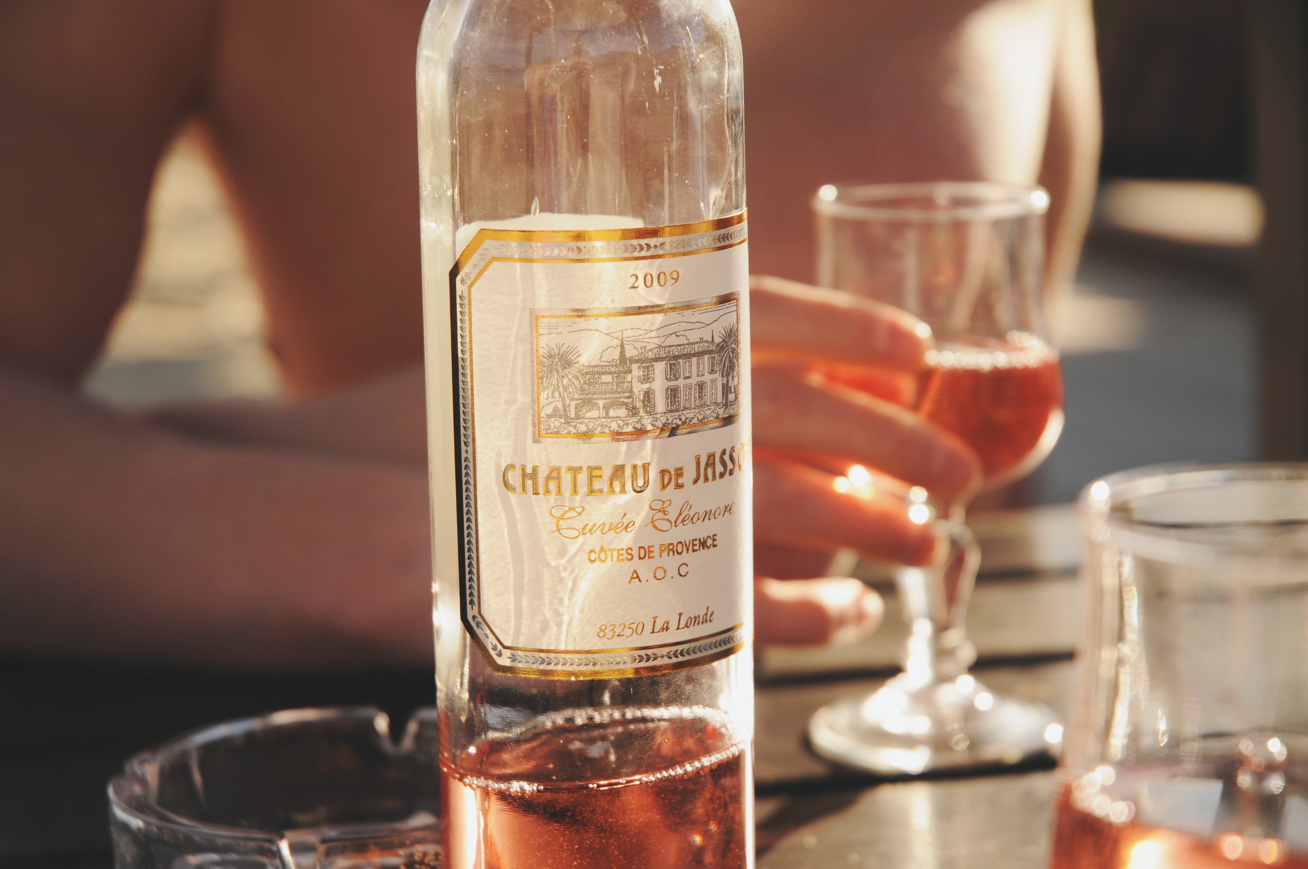 A bottle of rose wine on a table